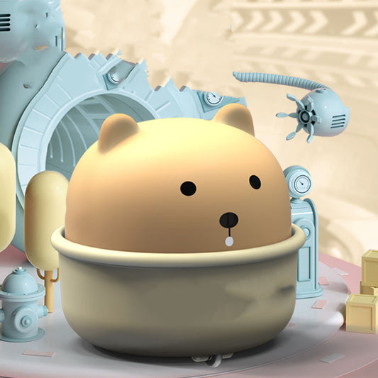 Cute cartoon-like creature with a beige body and brown head in a mechanical setting