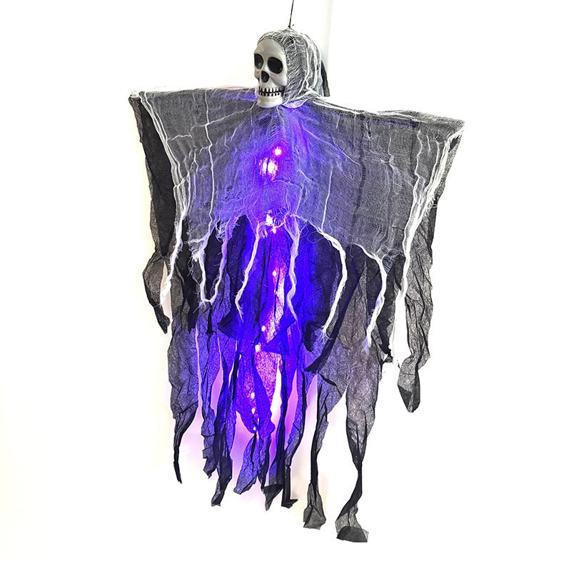 Hanging ghost decoration with LED lights on a white background