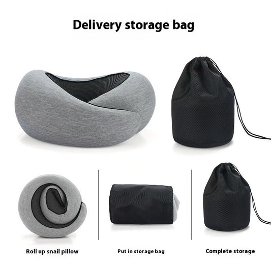Gray travel neck pillow with black storage bag on a white background