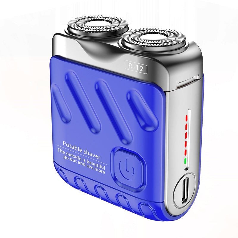 Blue portable shaver with silver top on a white background