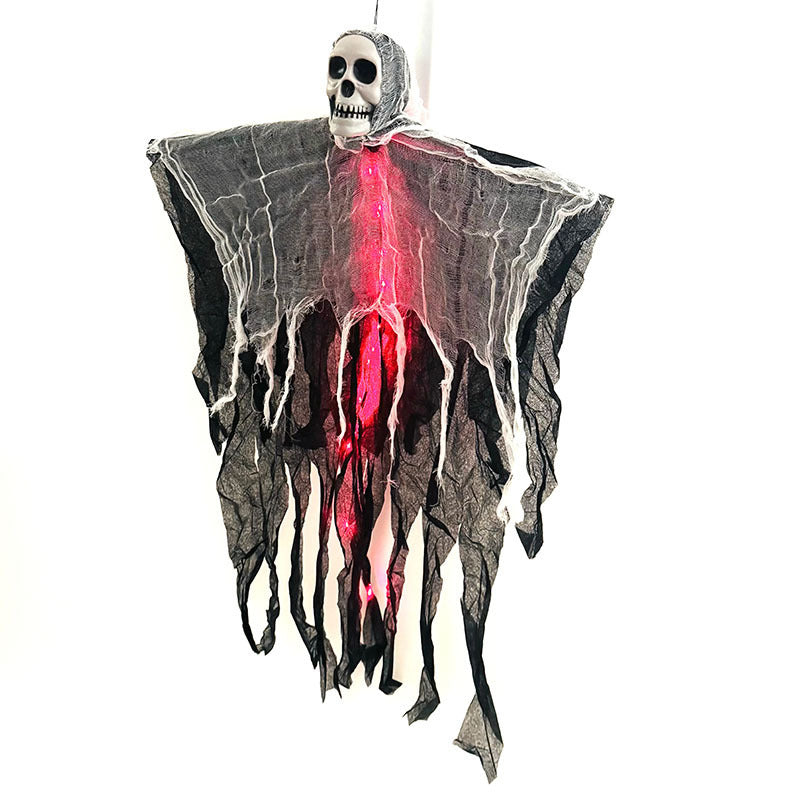 Hanging ghost decoration with a skull head and red interior on a white background