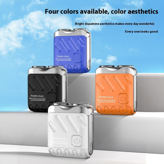 Four different colored portable shavers on a railing with a blue sky background.