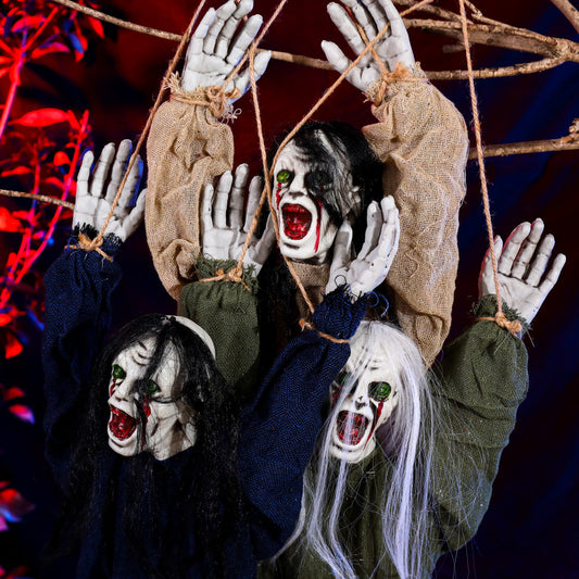 Horror-themed decoration with masked figures and bound hands against a dark background.