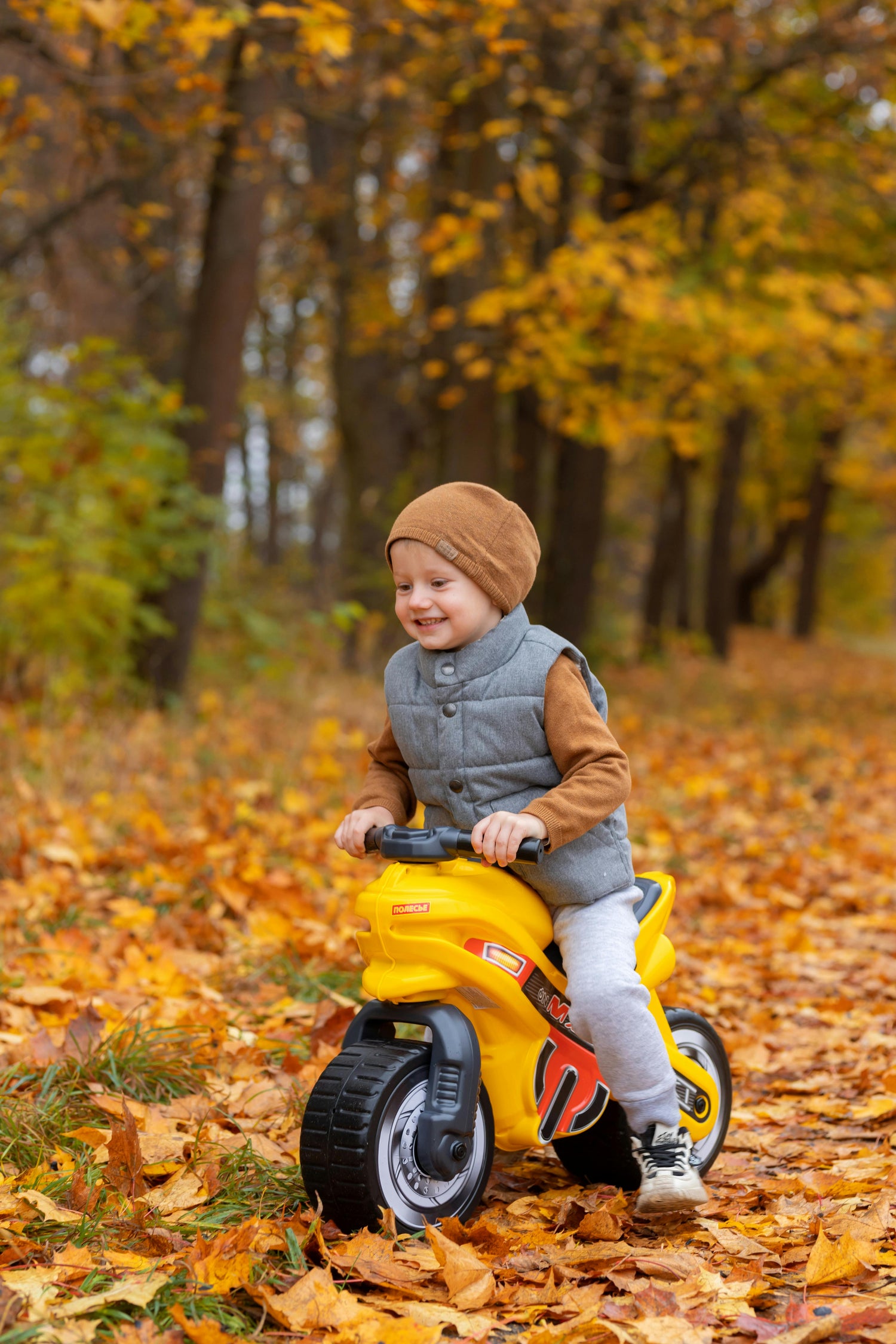 Kid playing with ride on toy