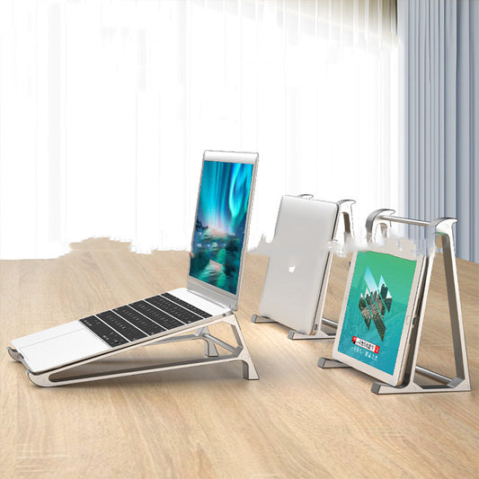 Laptop, tablet, and smartphone on stands with screens displaying different images on a wooden surface.