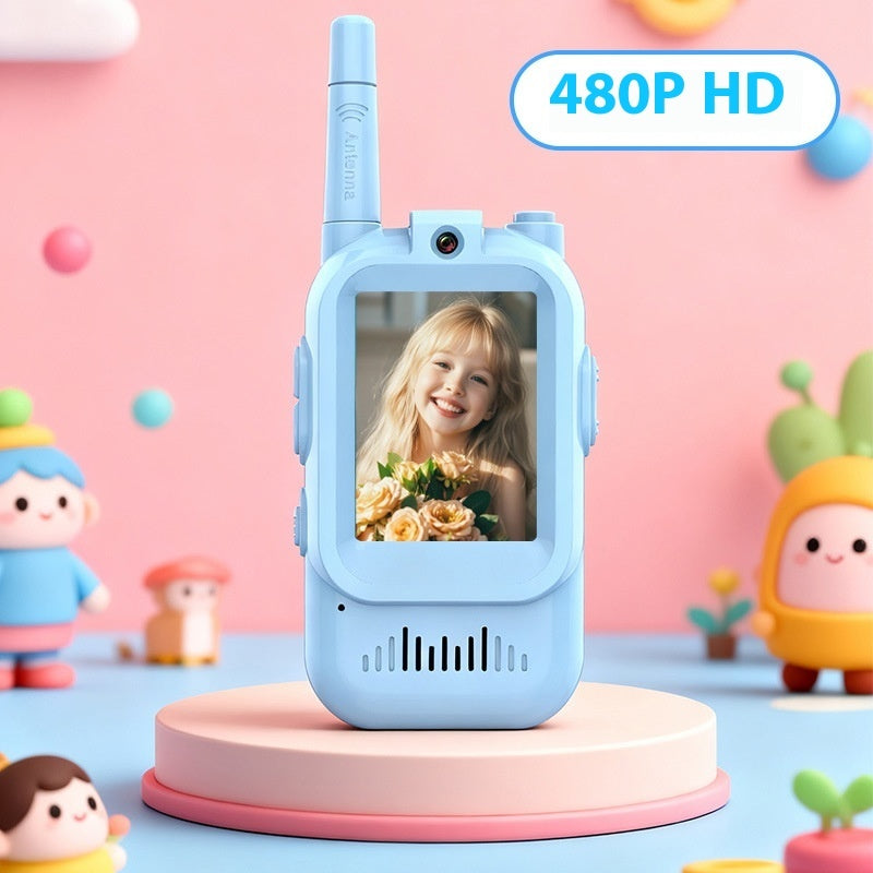 Children's walkie-talkie with a screen displaying a child's face, set against a colorful background with toys.