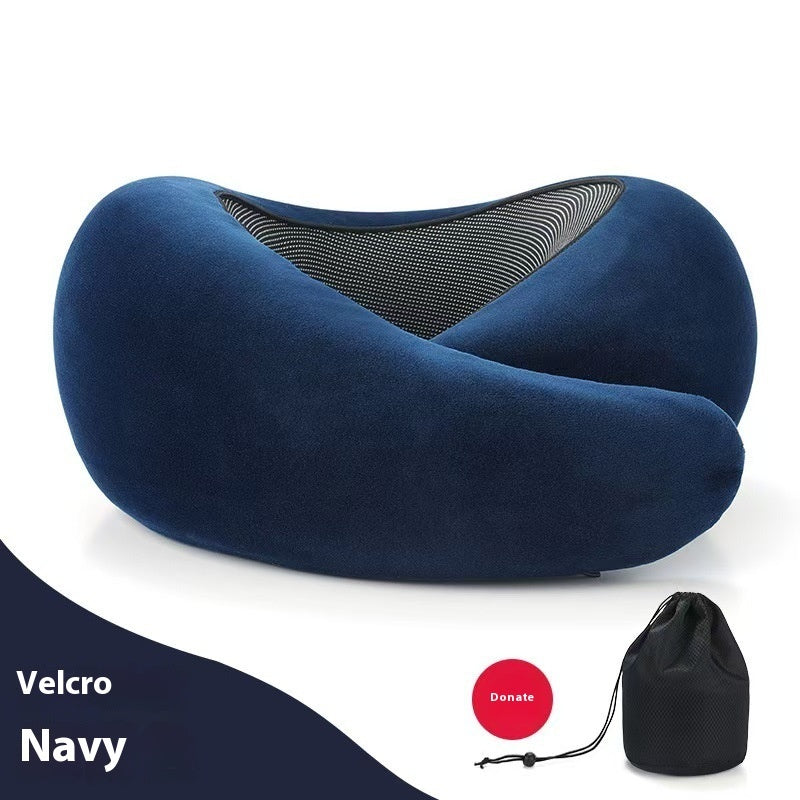 Navy blue travel pillow with a black carrying pouch on a white background