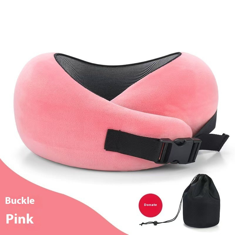 Pink travel neck pillow with black buckle and carrying pouch on a white background