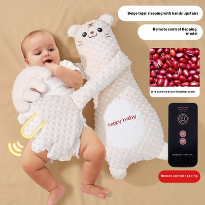 Baby playing with a white plush toy tiger and a remote control on a beige background
