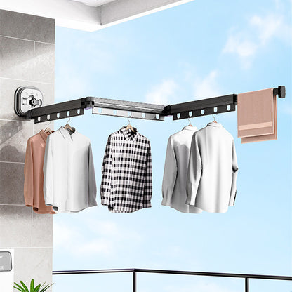 Corner clothes rack with hanging clothes against a blue sky background