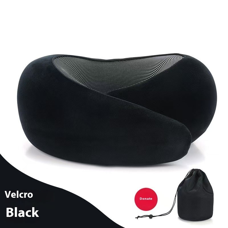 Black travel neck pillow with a carrying pouch on a white background