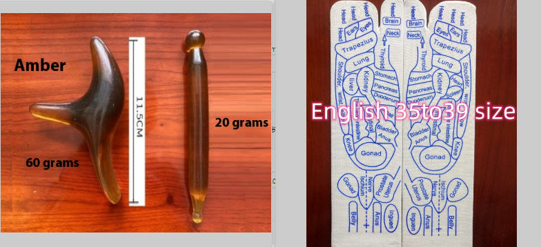 Two wooden tools with measurements and a chart on a wooden surface