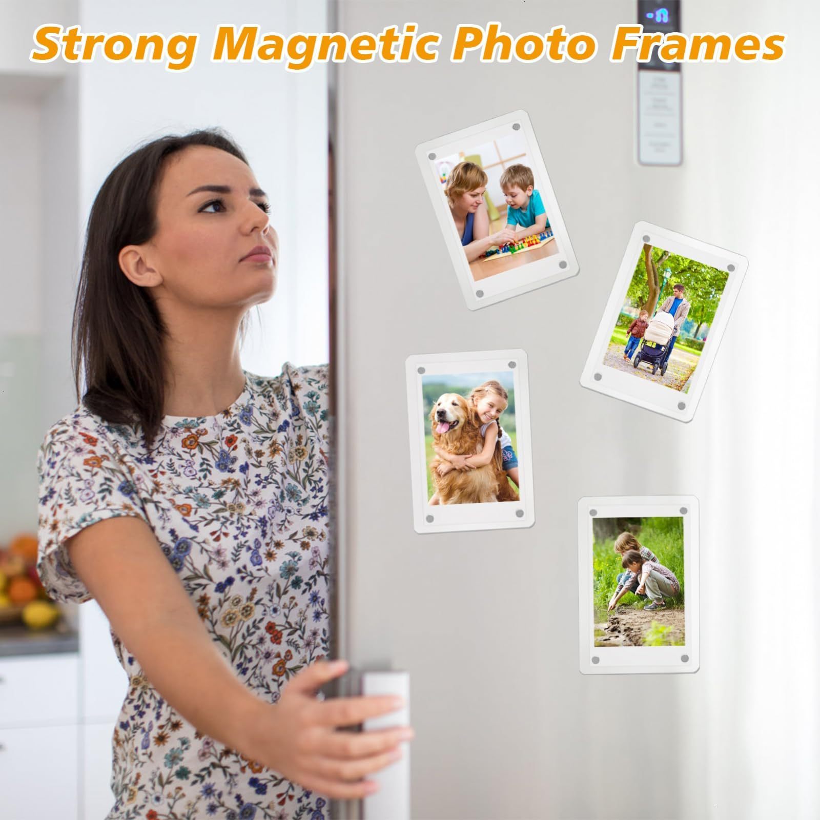 Woman looking at strong magnetic photo frames on a refrigerator with various family photos.