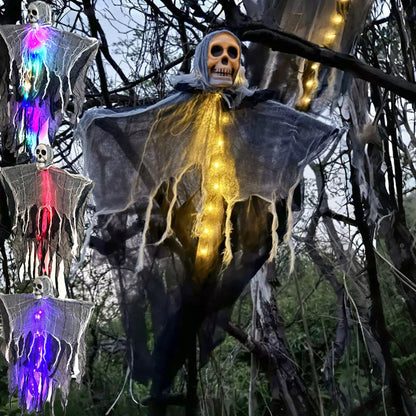 Decorative Halloween figure with glowing lights in a forest setting