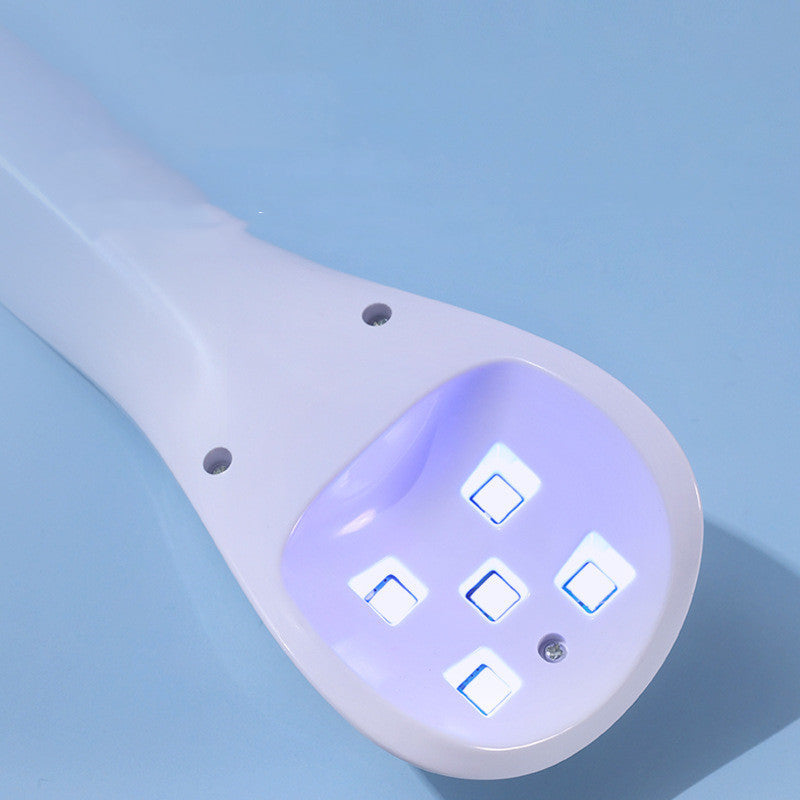 White handheld device with illuminated buttons on a light blue background