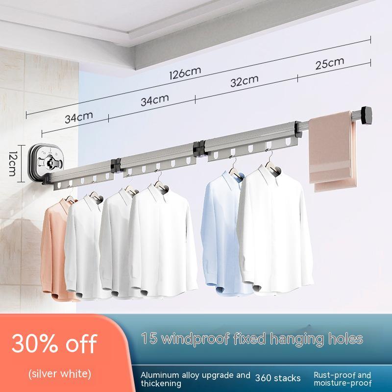 Clothing rack with clothes and measurements on a white wall, with a discount banner at the bottom.