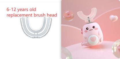 Replacement brush head for children's toothbrush with a cute cartoon character design on a pink background.