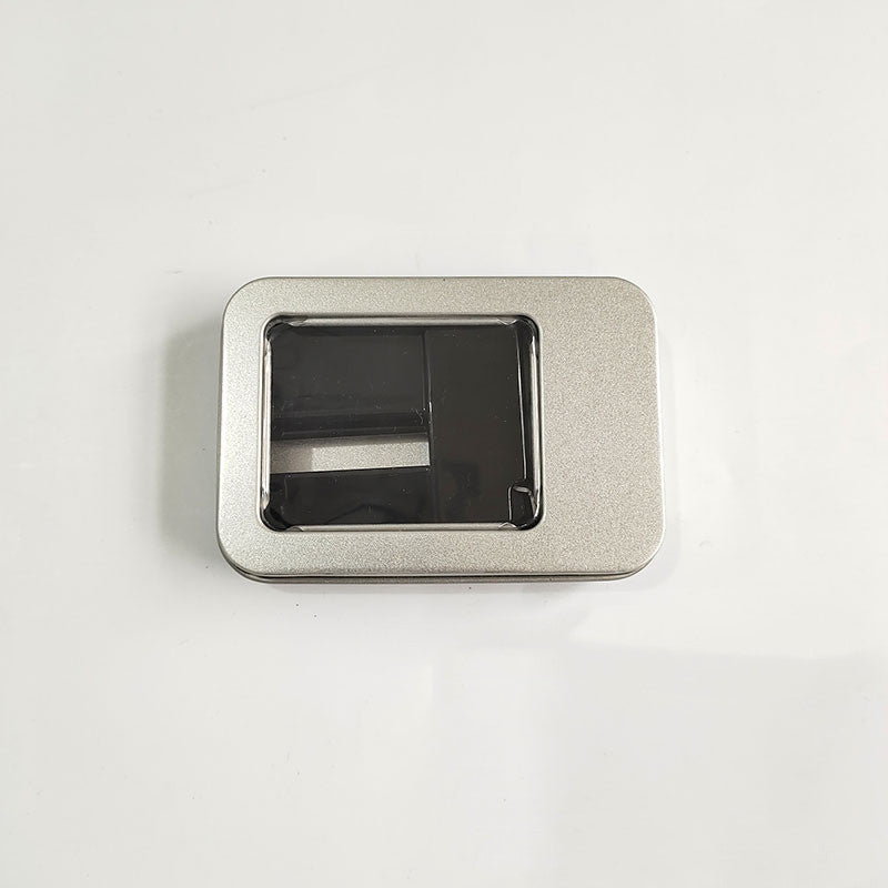 Metallic square object with a central black rectangular component on a light gray background