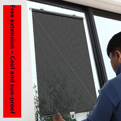 Person installing a black window screen with text on a red background