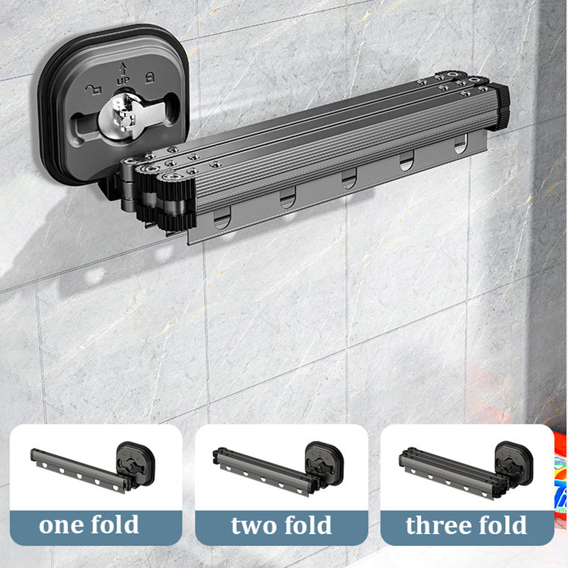 Wall-mounted shower curtain rod with extension options on a tiled wall.
