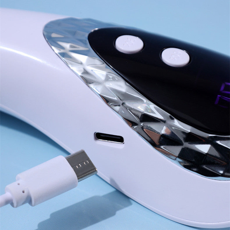 White electronic device with USB cable on a light blue background