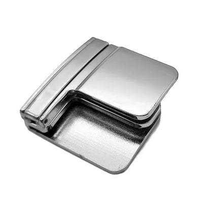 Metallic belt buckle on a white background