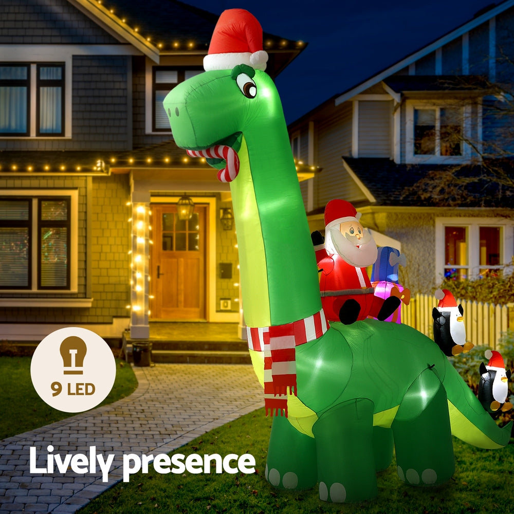 Christmas Inflatable Santa Dinosaur Decorations at night