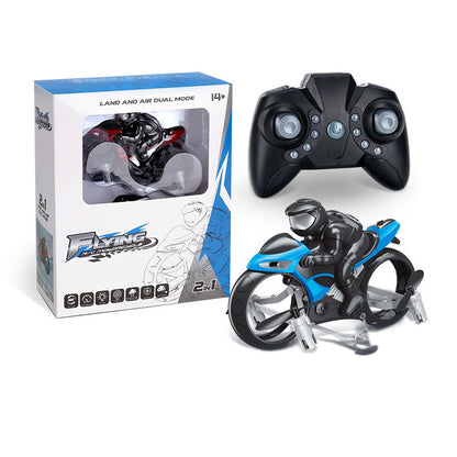 Toy motorcycle, remote control, and packaging on a white background