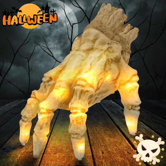 Halloween-themed decoration of a glowing hand with 'Halloween' text and skull icon in the background.