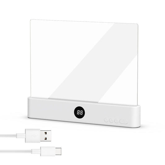 White electronic device with digital display and USB cable on a white background