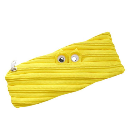 Yellow squid-shaped pouch with googly eyes on a white background