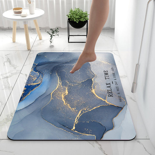 Decorative rug with abstract design and text on a marble floor.