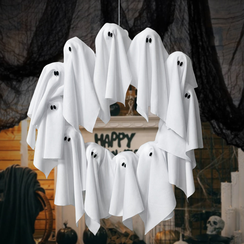 Hanging white ghost decorations against a Halloween-themed background with text.