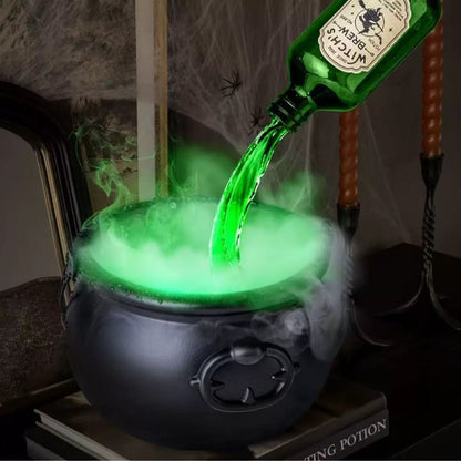 Green liquid being poured from a bottle into a cauldron with smoke effects, on a dark background.
